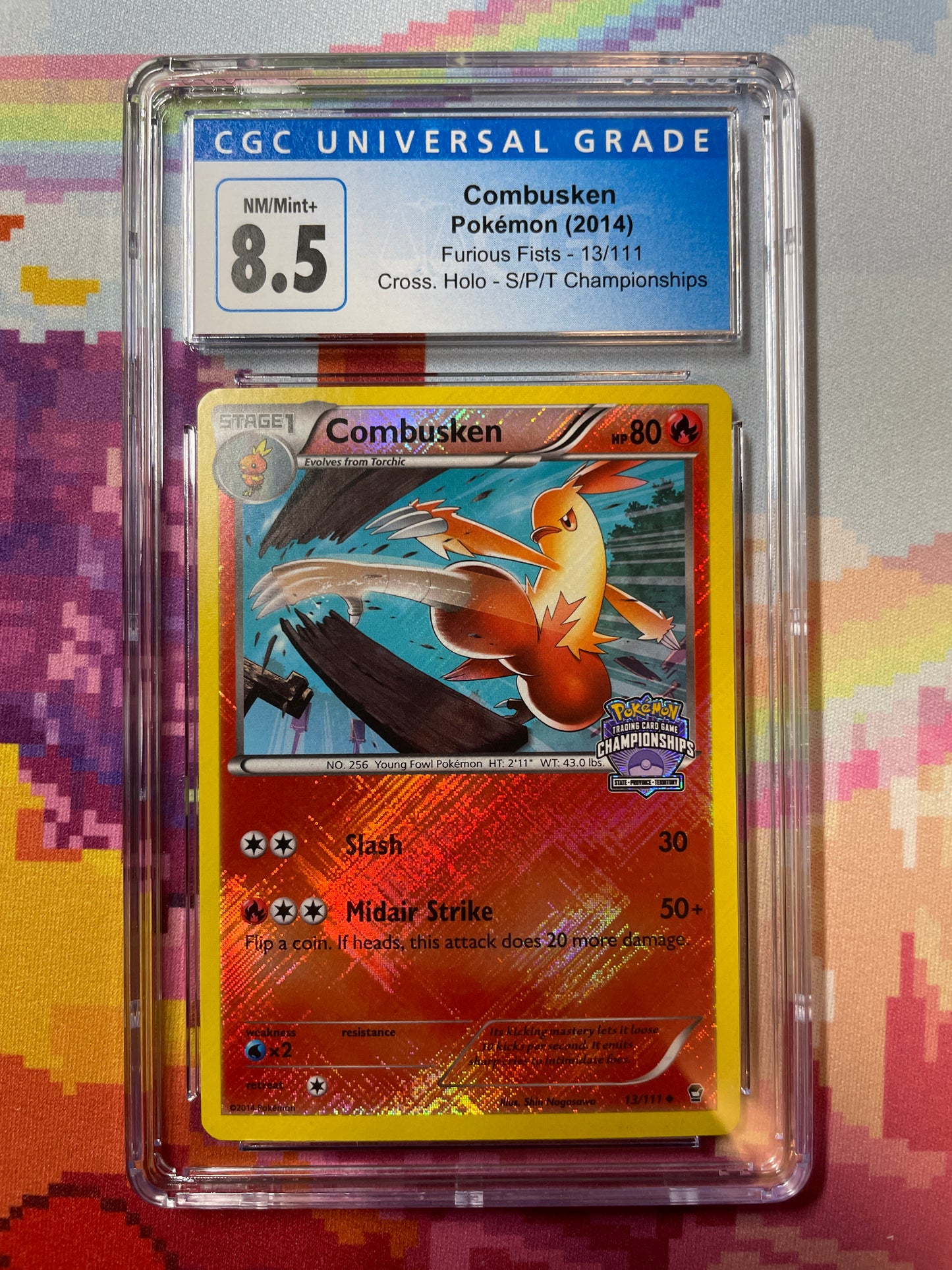 2014 Pokémon Furious Fists Combusken Crosshatch Holo 13/111 CGC 8.5 NM/Mint+