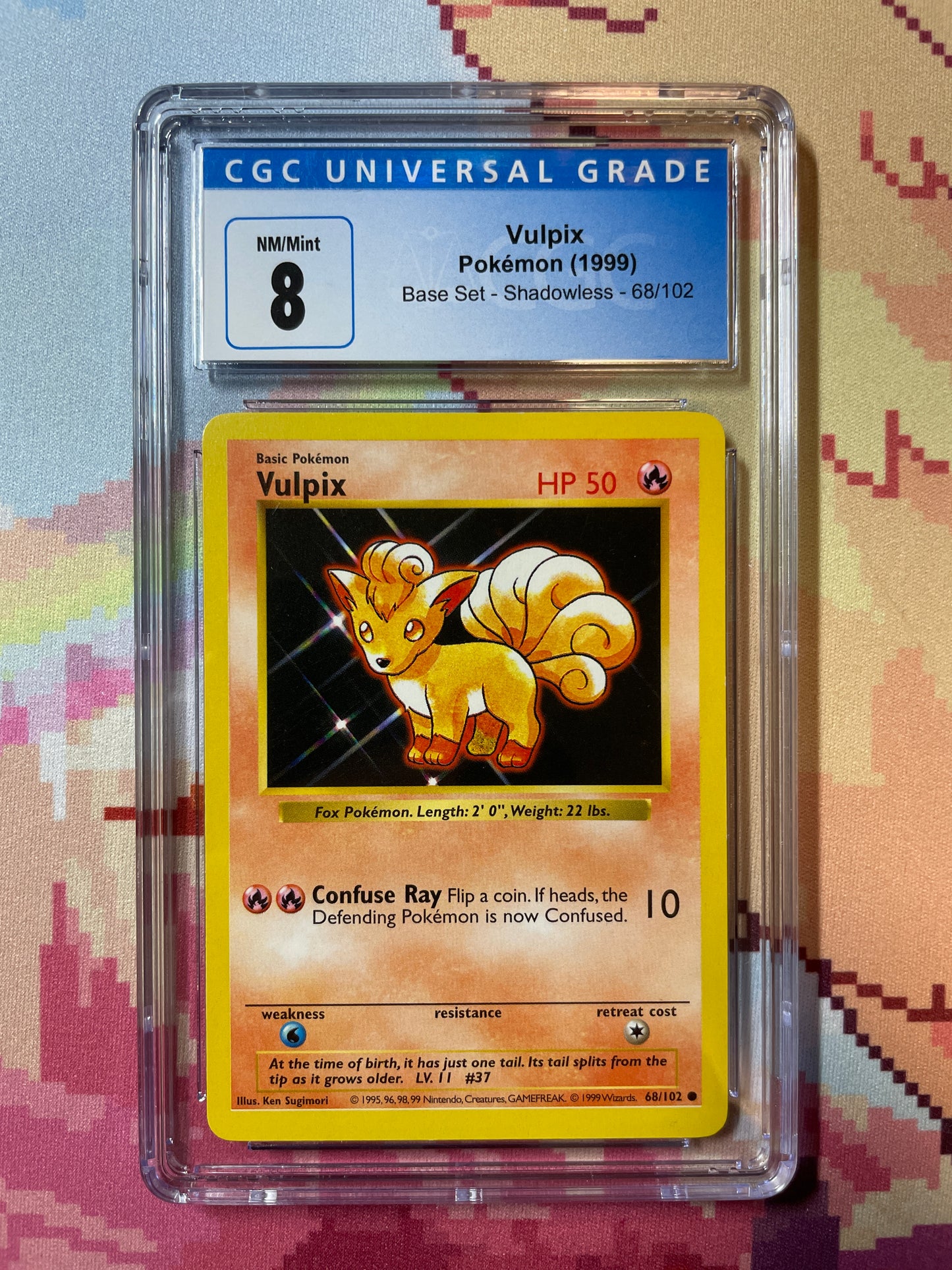 1999 Pokémon Base Set Shadowless Vulpix 68/102 CGC 8 NM/Mint