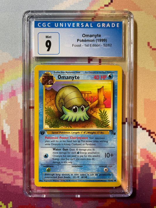 1999 Pokémon Fossil 1st Edition Omanyte 52/62 CGC 9 Mint