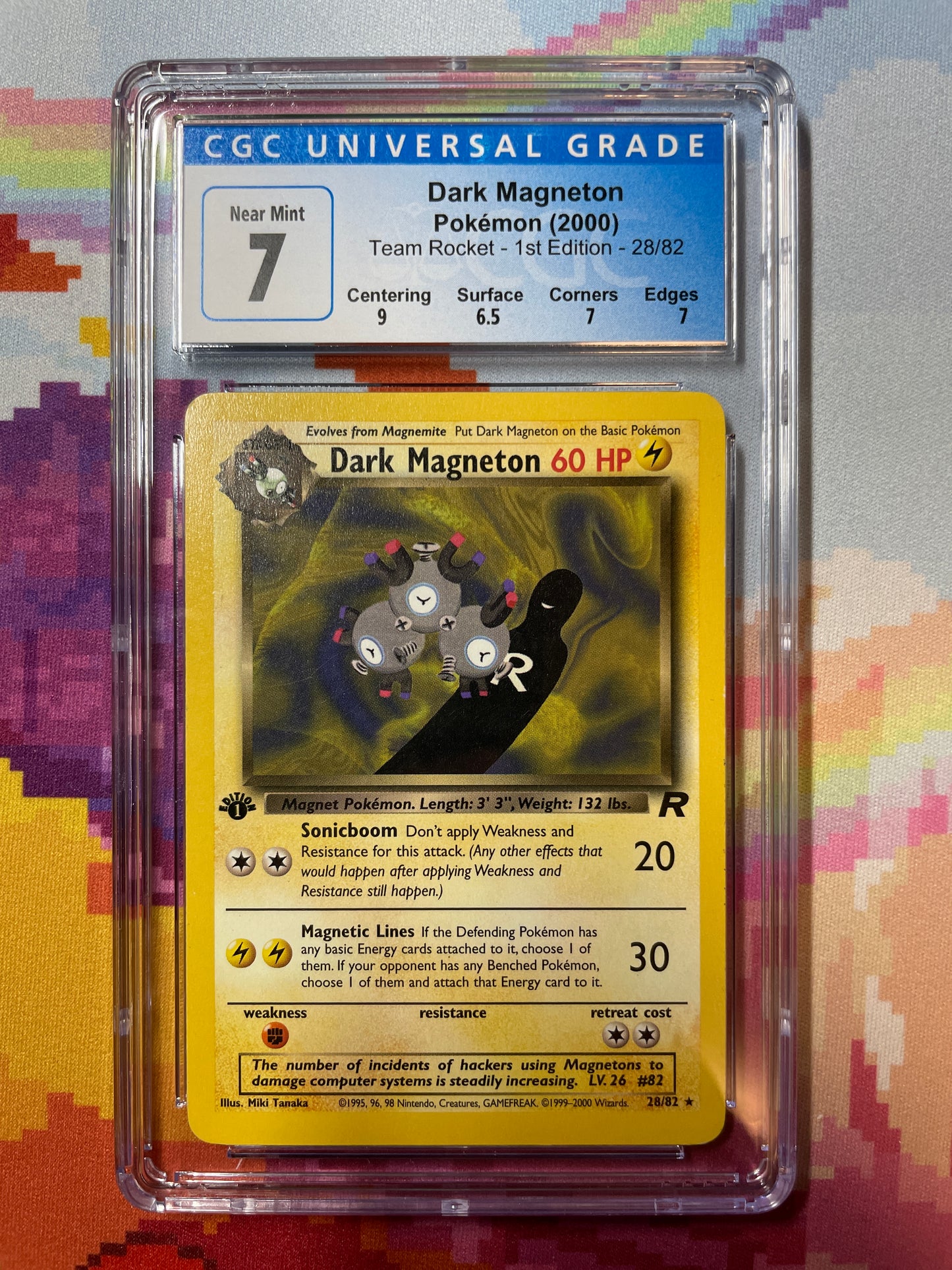 2000 Pokémon Team Rocket 1st Edition Dark Magneton 28/82 CGC 7 Near Mint