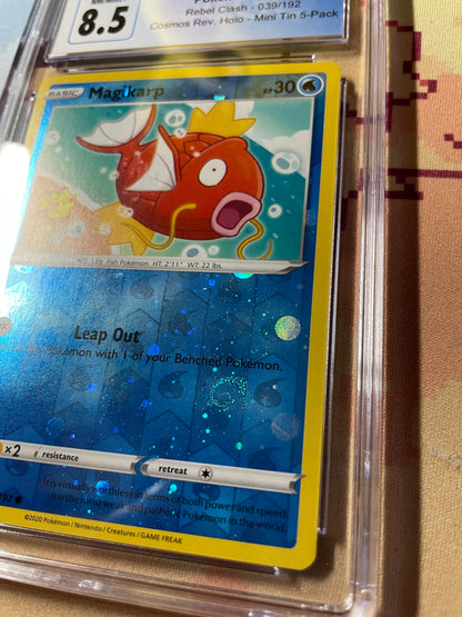 2020 Pokémon Rebel Clash Magikarp Reverse Cosmos Holo (Swirl) 039/192 CGC 8.5 NM/Mint+